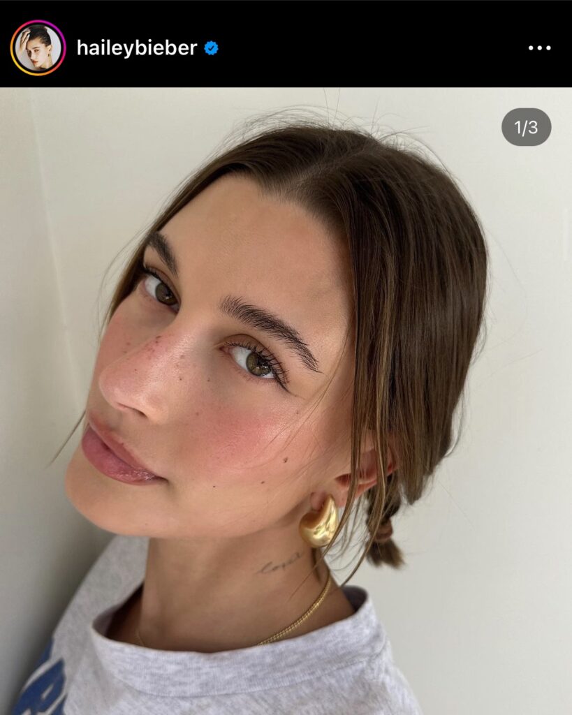 Hailey Bieber tomato makeup selfie