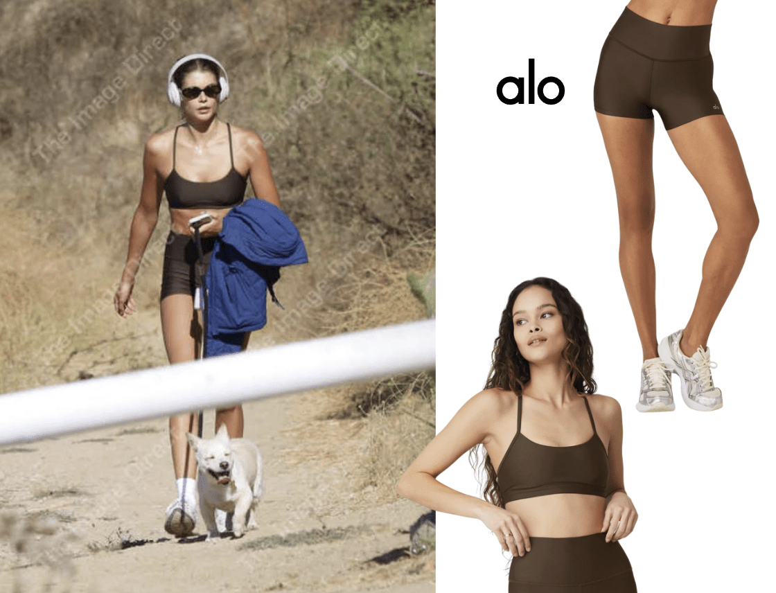 Kaia Gerber looks effortlessly chic while on a hike with her pup wearing a matching Espresso set from Alo Yoga.
