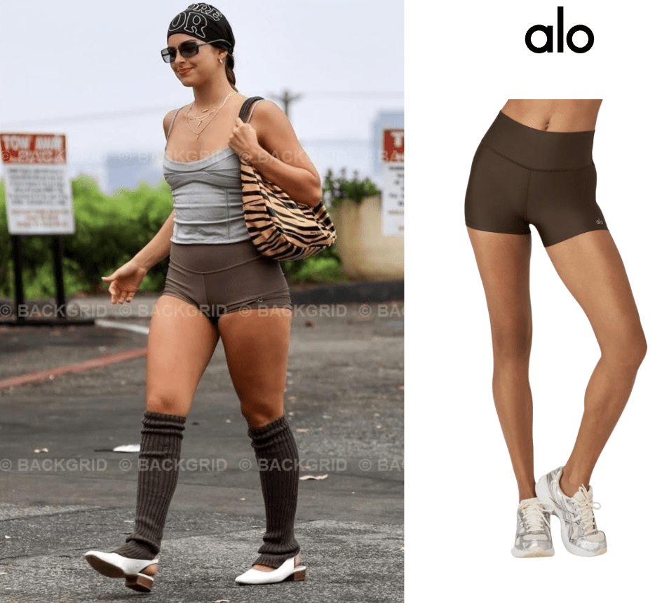 Trendsetter Addison Rae pairs her trusty Alo Yoga shorts with a Dior headband and adorable pair of leg warmers.
