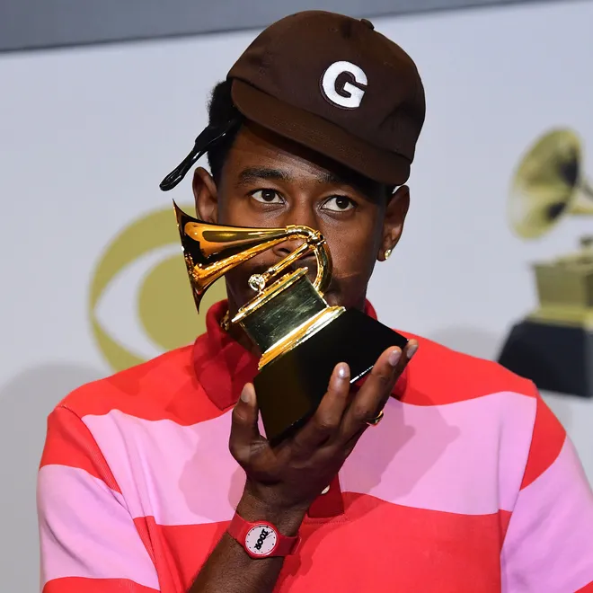 Tyler the Creator holding Grammy